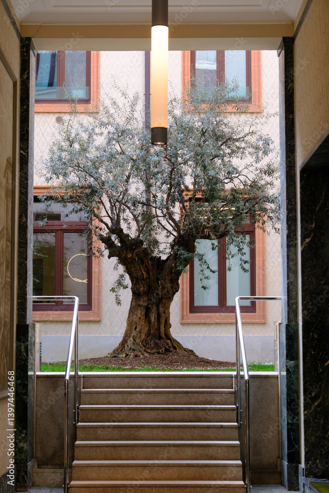 Old residential building along via Petrarca in Milan, Italy