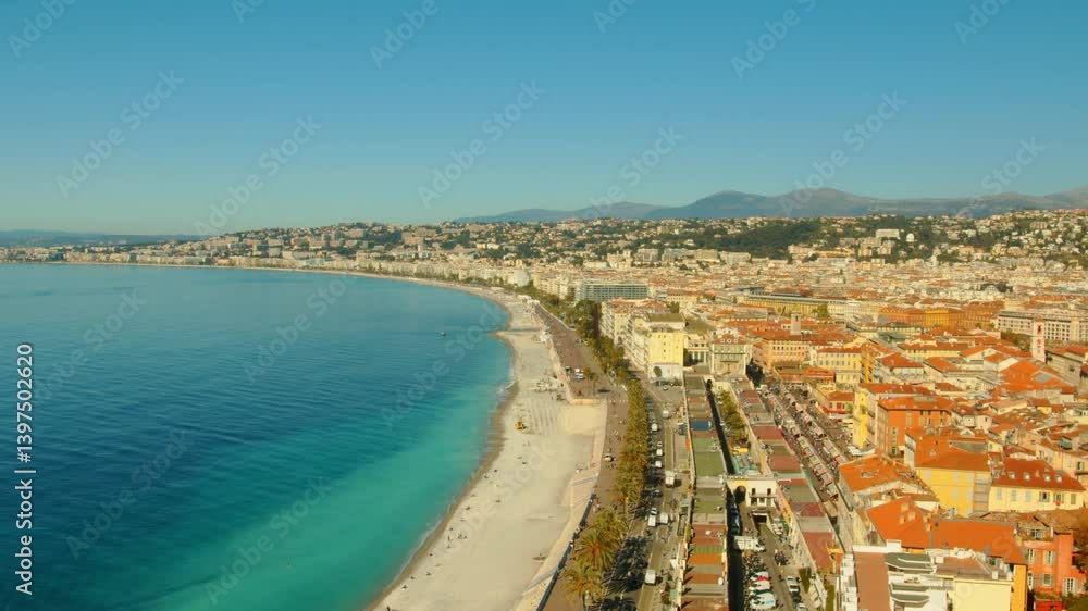 4K French Riviera Nice view of the old town from the Colline du Château with slow pan towards the breathtaking Baie des Anges and the entire coastline