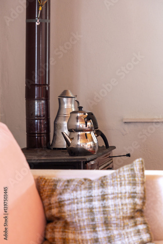 Obraz na płótnie Turkish tea pot warming on top of a wood stove w salonie