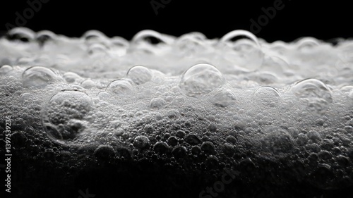 White Foam Bubbles on Black Background
