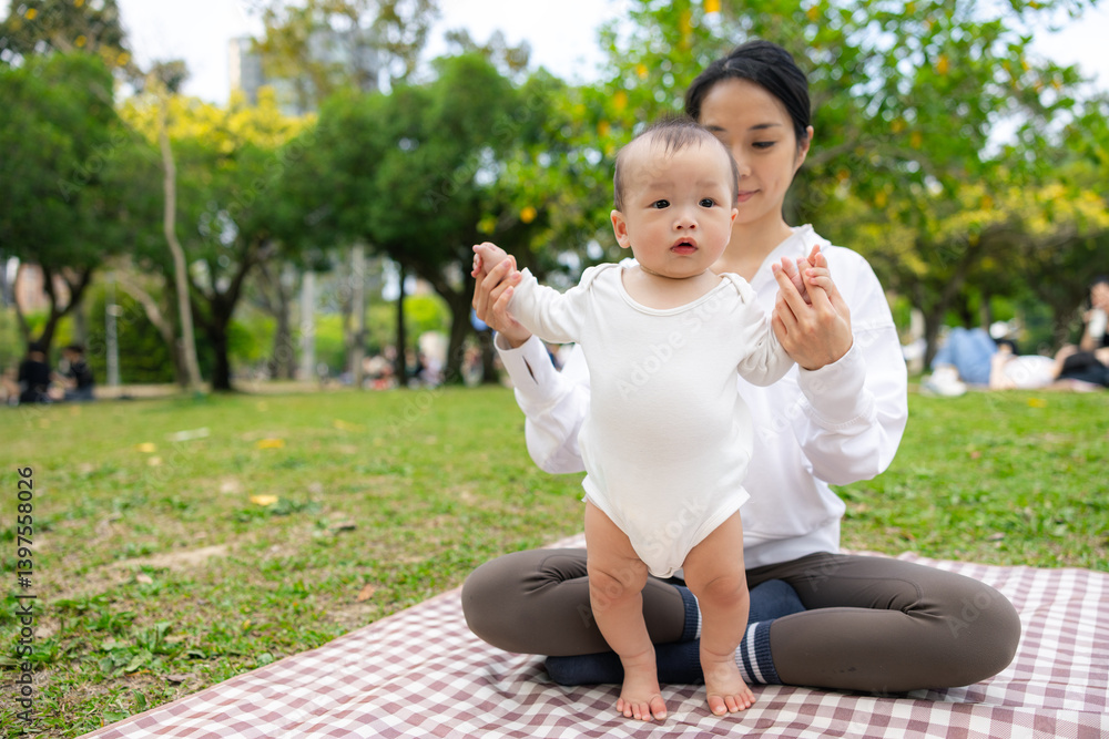 Mum going for picnic with her baby son at park