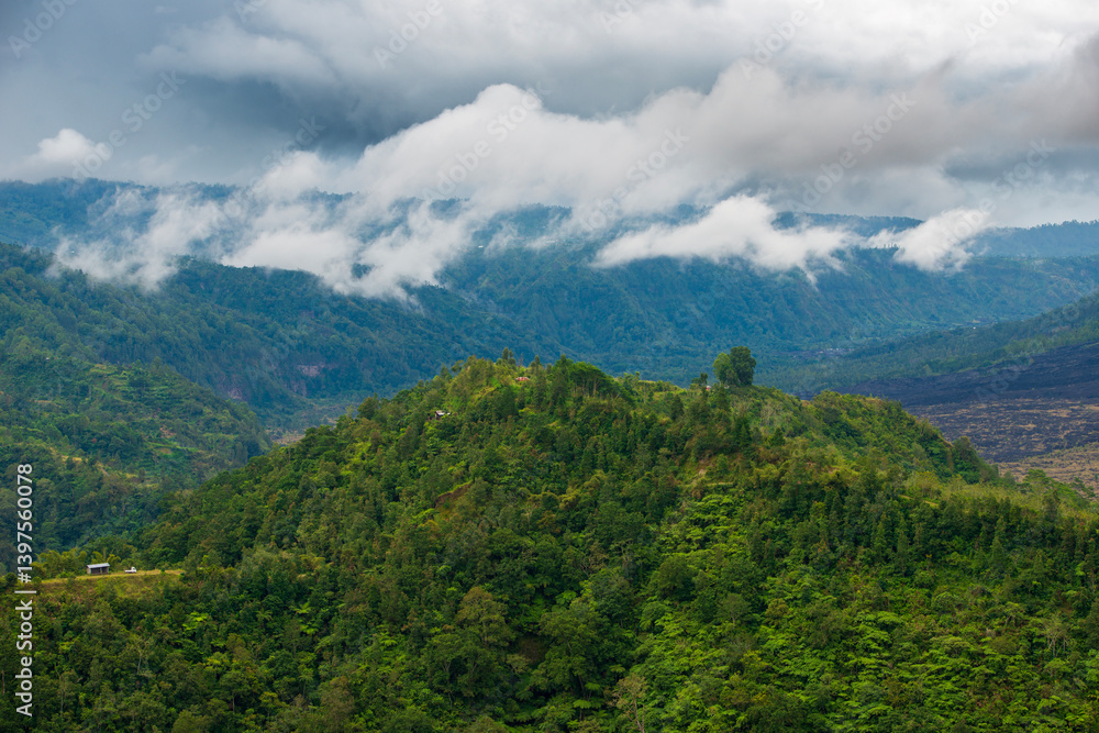 Bali mountain landscape with dramatic rain clouds Bali mountain landscape with dramatic rain clouds