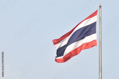 tree colors national Thailand flag red mean nation with white mean religon and blue mean majesty king flowing from wind blow on pole in sky background Free Download tree colors national Thailand flag red mean nation with white mean religon and blue mean majesty king flowing from wind blow on pole in sky background - GFXLoad