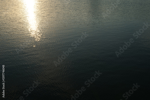 sunset over the sea, reflection in the water,