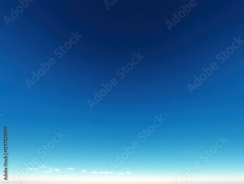 A serene panorama showcases a gradient expanse of a clear blue sky, an open invitation to serenity. 