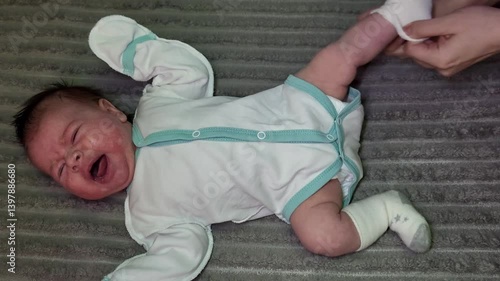 Put Socks On A Newborn Baby