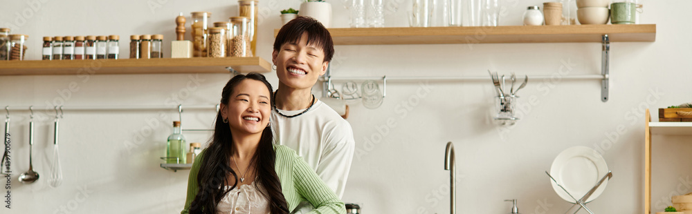 Joyful breakfast moments shared by a young couple at home in a cozy kitchen Joyful breakfast moments shared by a young couple at home in a cozy kitchen
