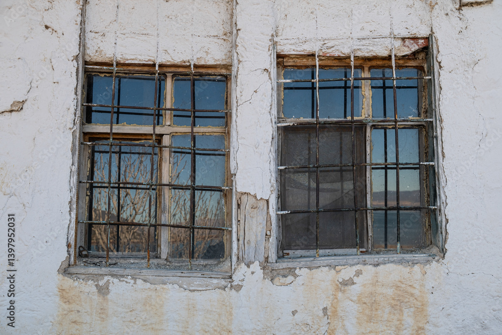 A window of an old and ruined house. A window of an old and ruined house.