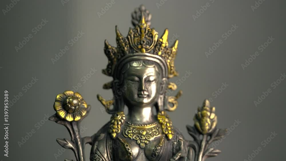 Close-up Guanyin Bodhisattva Statue. The concept of showing the dark and light sides of the human mind through the light and shadow of the statue. Close-up Guanyin Bodhisattva Statue. The concept of showing the dark and light sides of the human mind through the light and shadow of the statue.