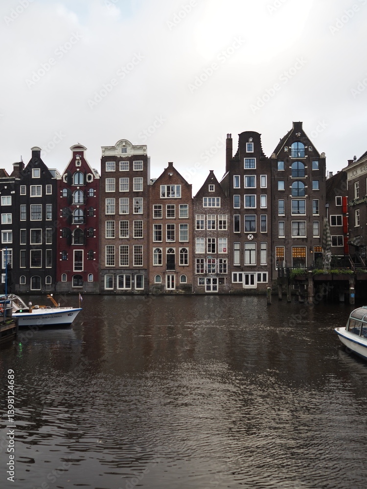 Naklejka premium Amsterdam Dutch city landscape, canel