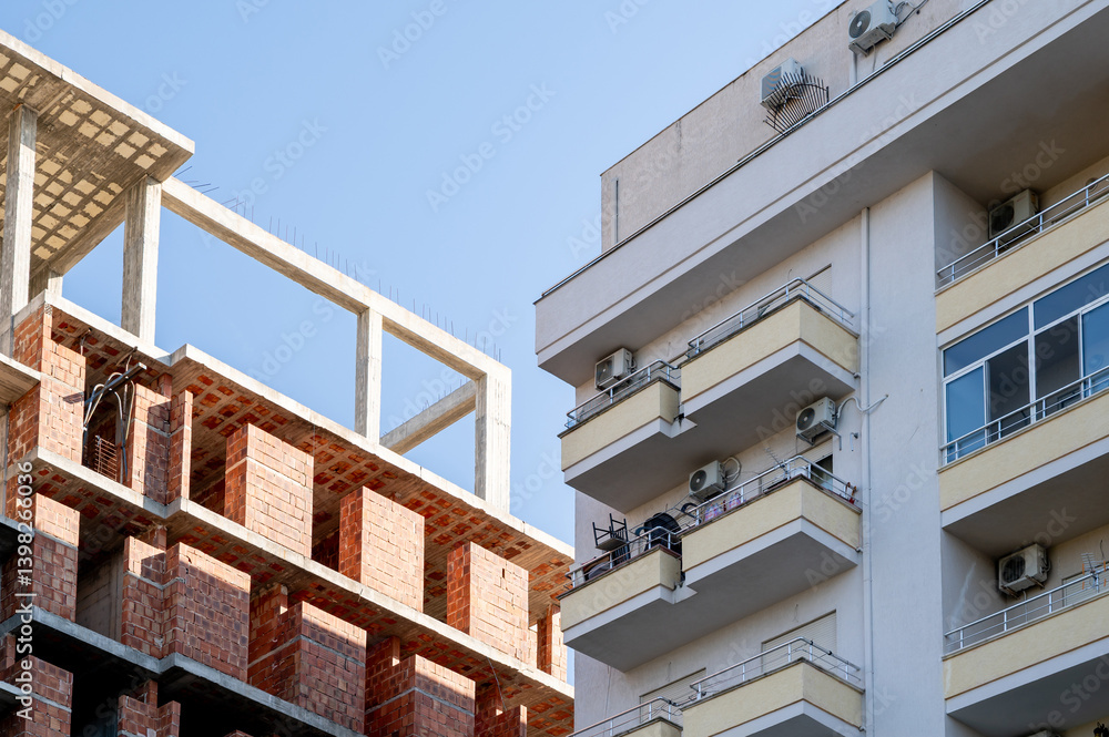 Active construction site showing the development of a new residential apartment complex in Albania.