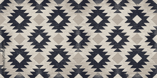 Geometric black and white patterned textile featuring diamond motifs.