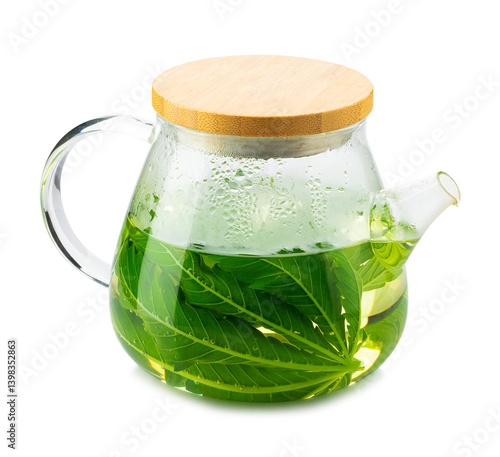Obraz na płótnie Freshly brewed cannabis tea in a glass teapot isolated on a transparent background w salonie
