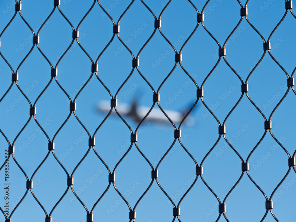 Fototapeta premium Safe Air Traffic Overhead: A Symbolic Image of Aviation Security