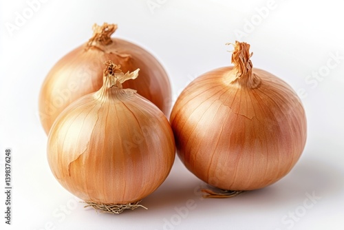 Wallpaper Mural A close up showing three golden onions against a plain surface isolated on white background Torontodigital.ca