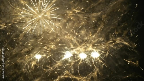 Golden fireworks display bursting in the night sky celebratory event occasion