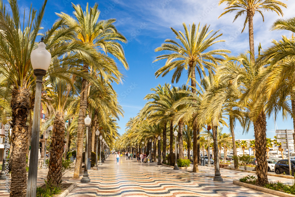 Alicante. The promenade called the Explanada de Espana. A sunny day. The start of the tourist season. Costa Blanca coast