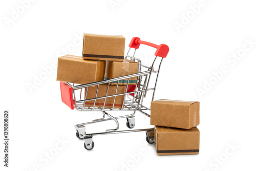 Online shopping concept.Cardboard box and shopping bags in a trolley isolated on white background. Shopping basket. Online shopping using a laptop, tablet, phone and credit card. Home delivery.