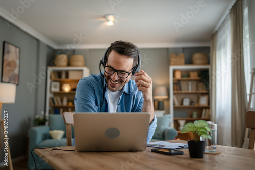 One man caucasian male freelancer work from home on laptop computer
