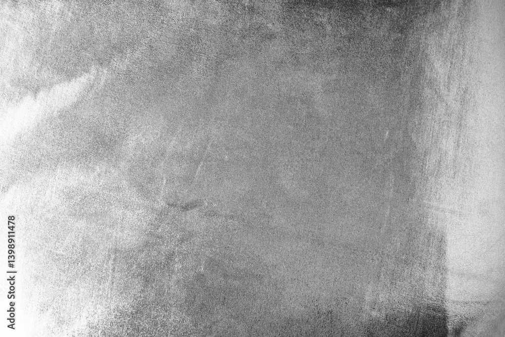 Black white gray silver abstract background. Shiny silk fabric. Metallic shine. Light reflection.