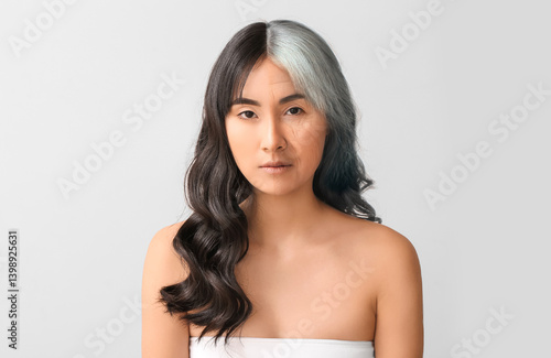 Young Asian woman with beau...