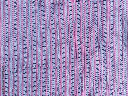 Colorful Handmade Textile Mat in Pink and Blue Stripes for Abstract Woven Background Design