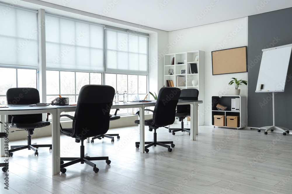 Interior of modern office with table prepared for meeting Interior of modern office with table prepared for meeting