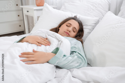 Young woman sleeping peacef...