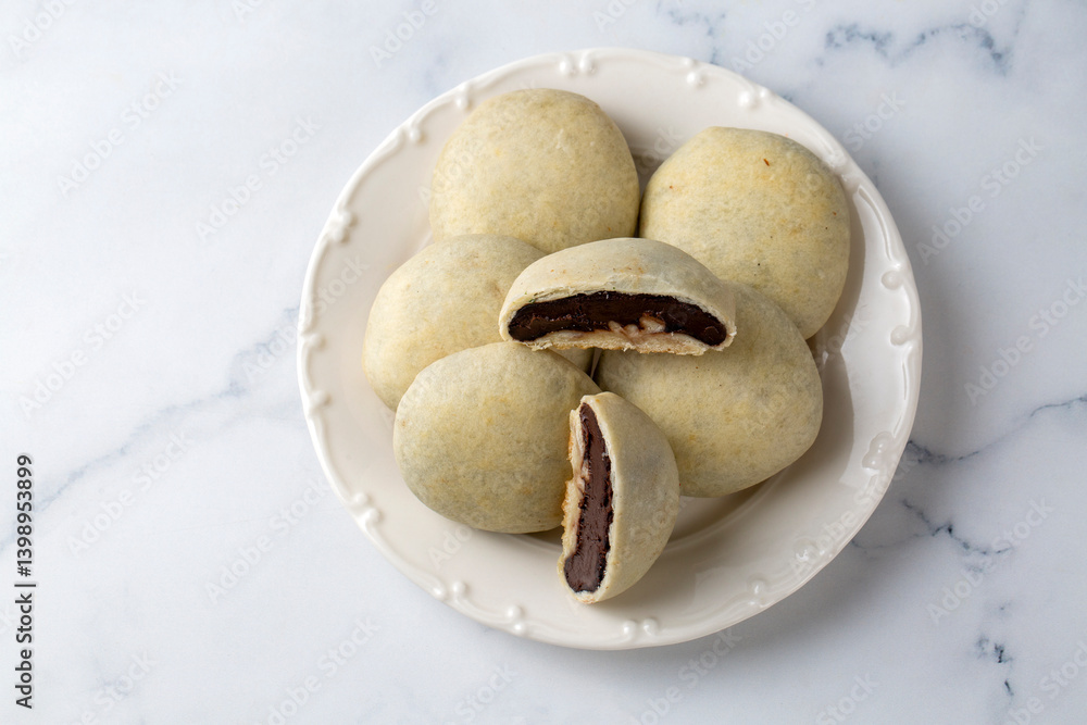 Bomb famous chocolate of Izmir. Chocolate inside thin baked dough. Turkish name is bomba. Izmir famous chocolate concept photo.