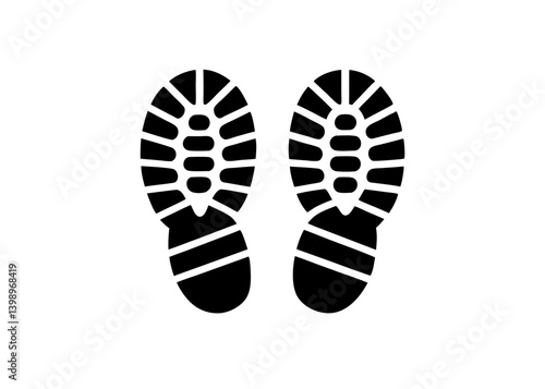 Footprint Impression: A striking black and white image showcases a pair of shoe footprints, a clear representation of movement and direction. The footprints are crisp and detailed.