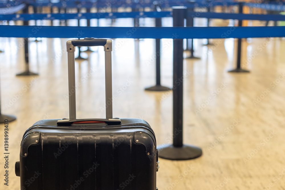 custom made wallpaper toronto digitalBlack suitcase waiting in line at Punta Cana airport during busy travel season