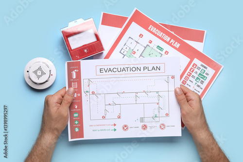 Man with evacuation plans, ...