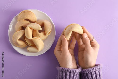 Female hands with plate of ...