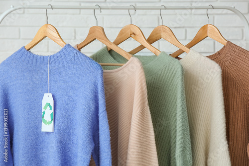 Obraz na płótnie Hanger with natural clothes for recycling indoors w salonie