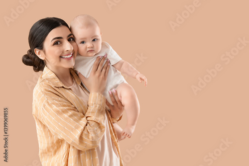 Happy mother with her littl...