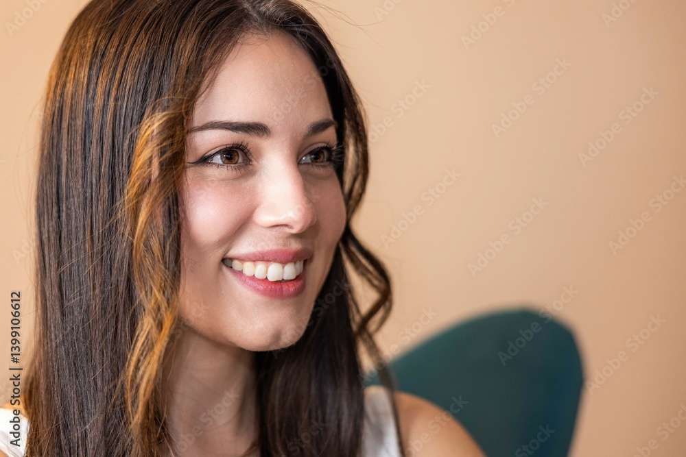 Naklejka premium Young beautiful woman sitting at home relaxing