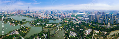 Obraz na płótnie Aerial View of the Urban Landscape with River and Parks w salonie