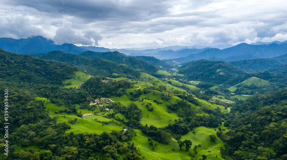 Fototapeta premium Aerial View Of Lush Green Valley Between Mountains