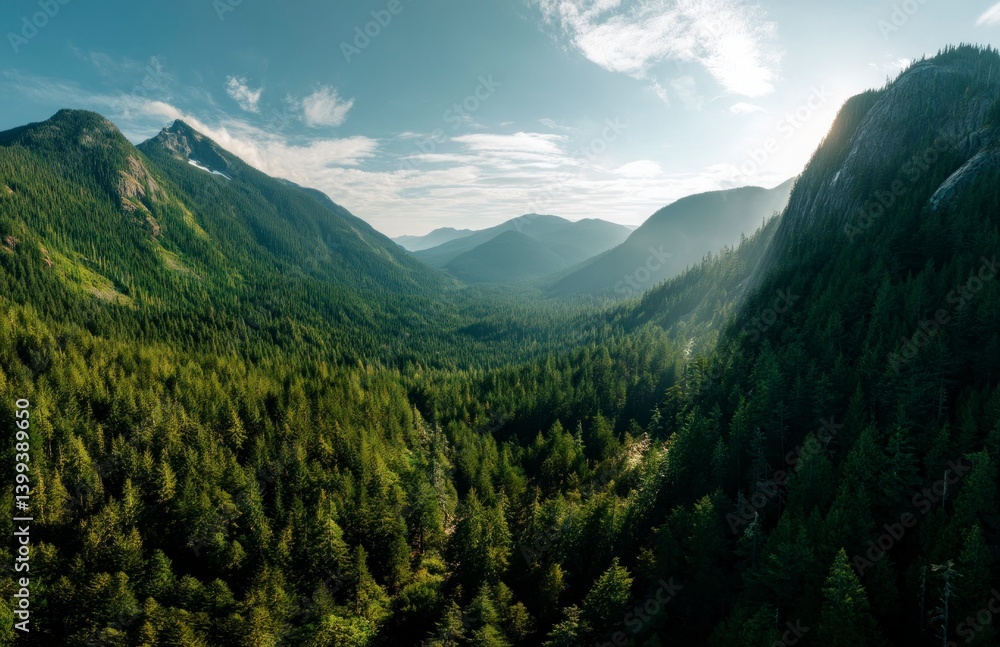 Valley View with Green Trees and Distant Mountains Under Bright Sky Valley View with Green Trees and Distant Mountains Under Bright Sky