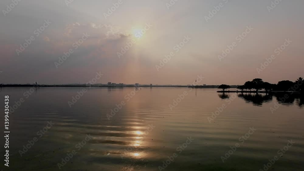 Sunset Reflecting On Calm Water Lake During The Sunset Time Sunset Reflecting On Calm Water Lake During The Sunset Time