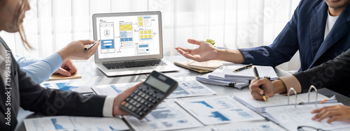 Obraz na płótnie Business intelligence and data analysis concept. Analyst team working on financial data analysis dashboard on laptop screen as marketing indication for effective business strategic planning. Insight w salonie