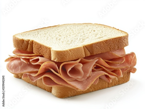 Delicious stacked ham sandwich featuring white bread layers served on a white plain backdrop snack