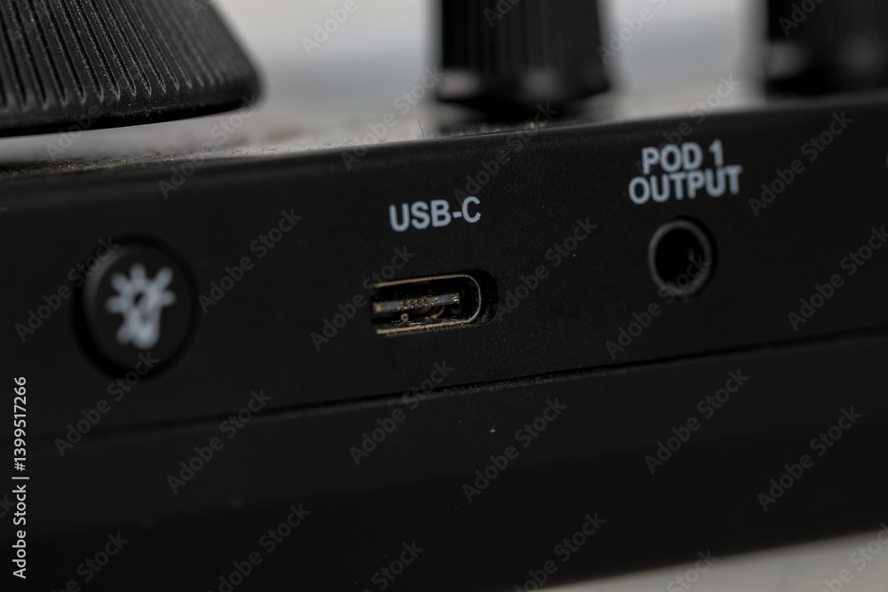 Fototapeta premium Usb-c connection for audio equipment close-up shot technology studio environment detail viewpoint connectivity innovation