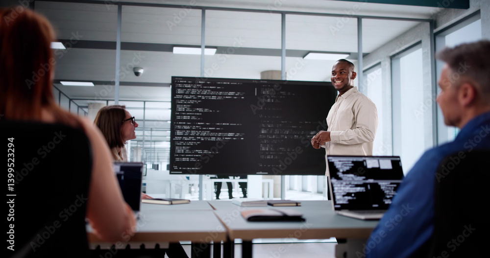 Team Of Diverse Developers Collaborate On Software Project