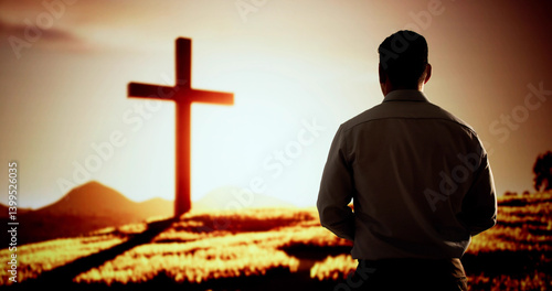 Man Praying To God's Light. Silhouette Of A Man Kneeling In Prayer