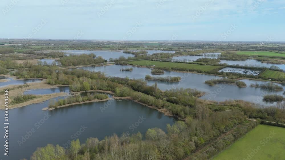 Aerial drone perspective of wetland habitat area for animals aquatic plant life birds fish in England Sunny day Spring Aerial drone perspective of wetland habitat area for animals aquatic plant life birds fish in England Sunny day Spring