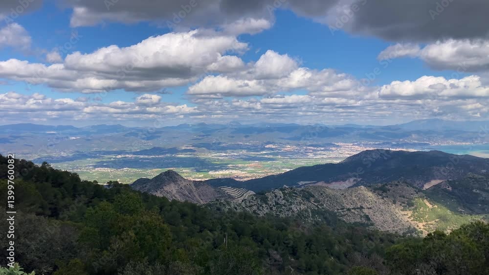 Panoramic view unfolds from the scenic hiking path leading to Mijas peak, showcasing the stunning landscapes of Andalusia, Malaga, Spain Panoramic view unfolds from the scenic hiking path leading to Mijas peak, showcasing the stunning landscapes of Andalusia, Malaga, Spain