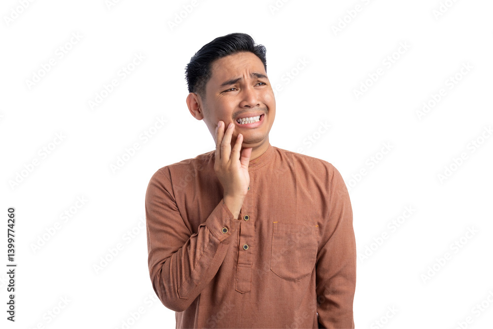 Unhealthy Asian Muslim man suffering from acute toothache, touching cheek with painful expression isolated on transparent background Unhealthy Asian Muslim man suffering from acute toothache, touching cheek with painful expression isolated on transparent background