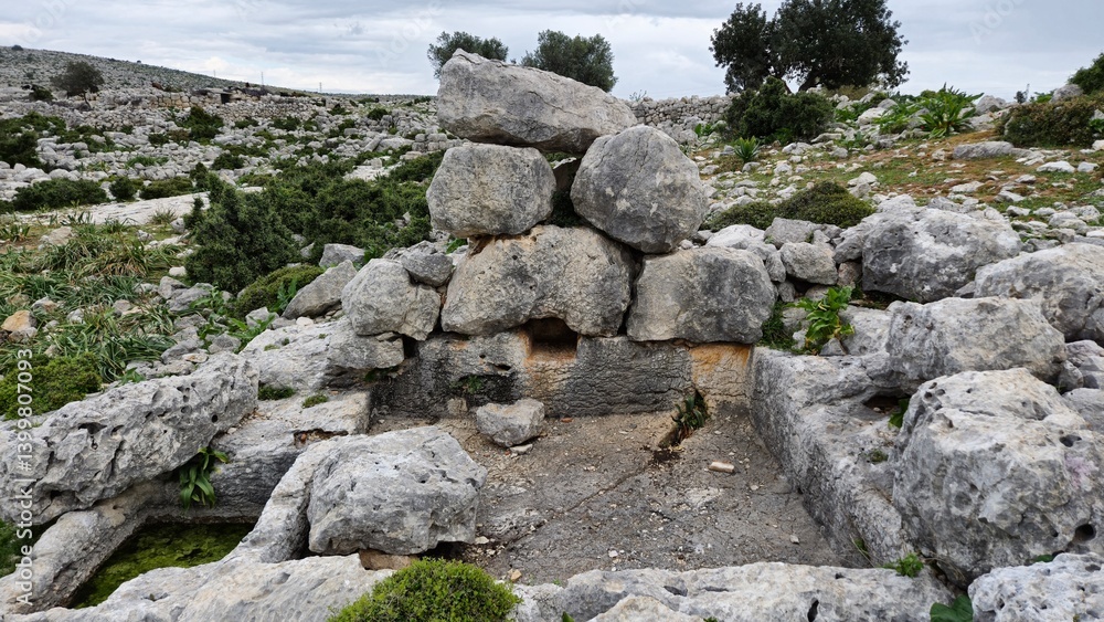 ancient wine press workshop from Roman Era located in the ruins of Sakizlik, in the Saglikli neighborhood of Tarsus, Mersin. A rectangular collection basin ancient wine press workshop from Roman Era located in the ruins of Sakizlik, in the Saglikli neighborhood of Tarsus, Mersin. A rectangular collection basin