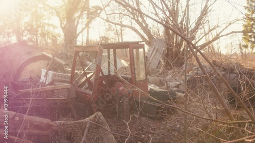 Wallpaper Mural Abandoned Red Tractor in Overgrown Yard with Sunlight Torontodigital.ca